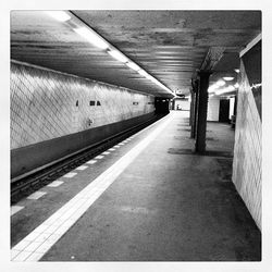 Empty road leading to tunnel