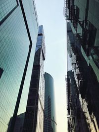 Low angle view of modern buildings against clear sky