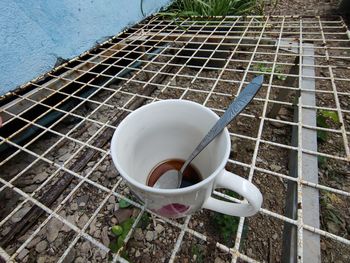 High angle view of coffee cup on table