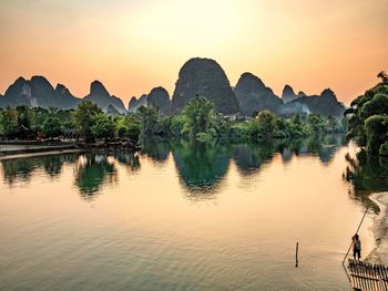 Scenic view of mountains against sky during sunset