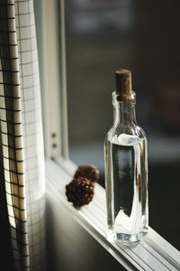 Close-up of wineglass on table at home