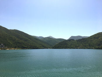 Scanno lake against mountains and sky, abruzzo, italy