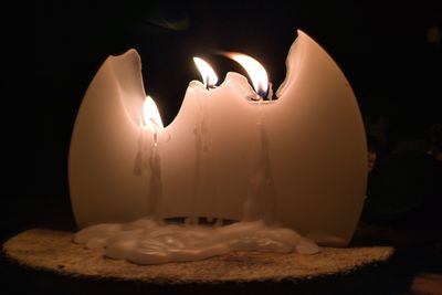 Close-up of illuminated cake