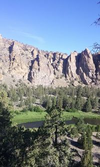 Scenic view of landscape against blue sky