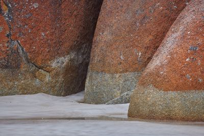 Close-up of rock by sea during winter