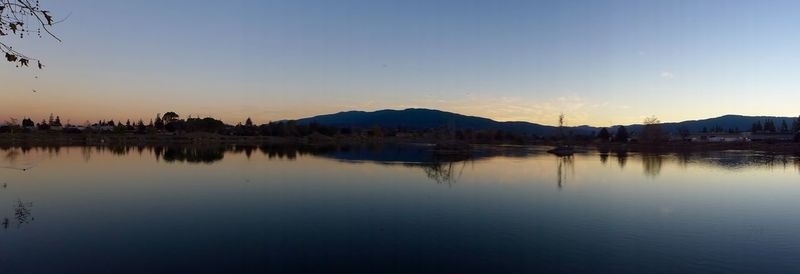 Scenic view of lake at sunset