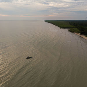 High angle view of sea against sky during sunset