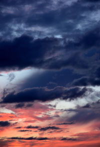 Low angle view of dramatic sky during sunset