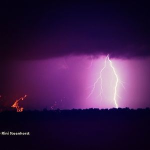 Lightning strike against sky