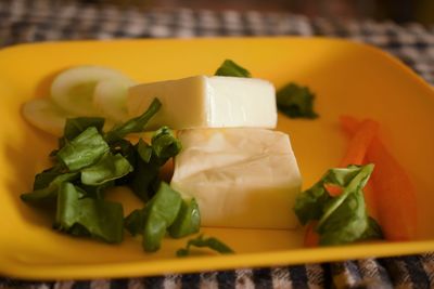 Close-up of served food in plate