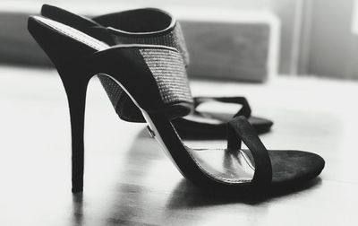 Close-up of shoes on table