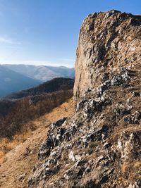 Scenic view of rocky mountains against sky