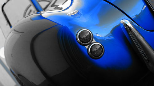 Close-up of blue car
