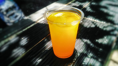 Close-up of drink on glass table