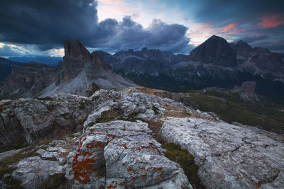 Scenic view of mountains against cloudy sky