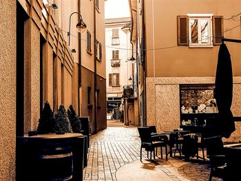 Empty chairs in front of building