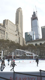 Buildings in city during winter