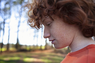 Close-up of boy in backyard