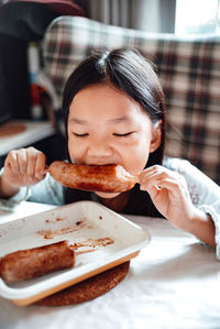 Portrait of a girl having food
