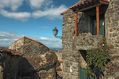 Low angle view of old building against sky