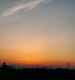 Scenic view of silhouette landscape against sky during sunset