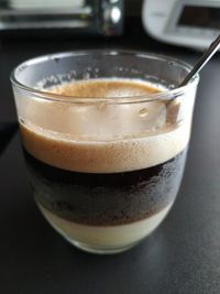 Close-up of coffee cup on table