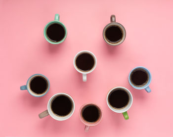 Directly above shot of coffee cups on table