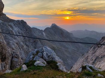 Scenic view of mountains against sky during sunset