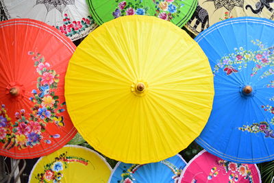 High angle view of colorful umbrellas for sale at market