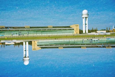 View of built structures against blue sky