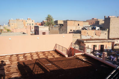 View of residential buildings against clear sky