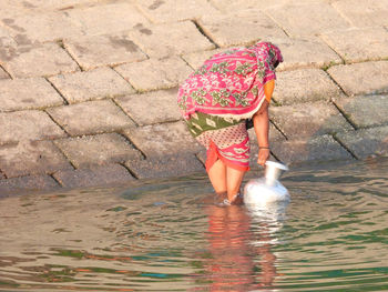 Full length of woman in water