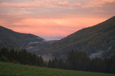 Scenic view of mountains against sky during sunset