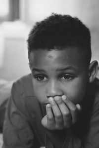 Close-up portrait of boy at home