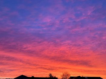 Low angle view of dramatic sky at sunset