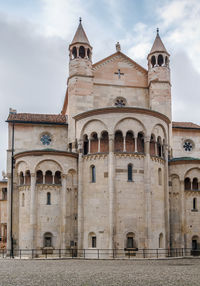 Facade of historic building against sky