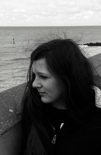 Woman standing on beach