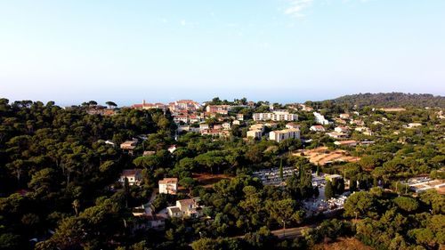 High angle view of buildings against clear sky