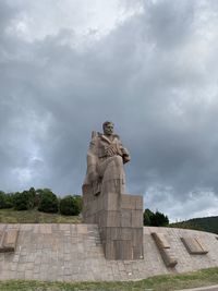 Low angle view of statue against sky