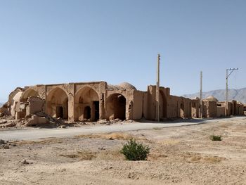 Old ruins in desert against clear sky