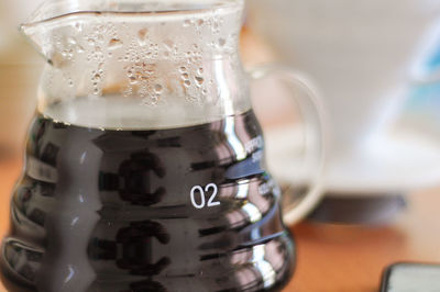 Close-up of coffee cup on table