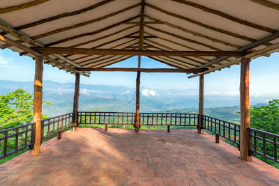 Observation point over green landscape against sky