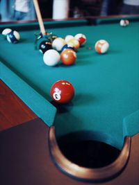 Close-up of pool balls on table