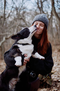 Portrait of woman with dog