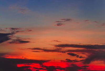 Low angle view of dramatic sky during sunset