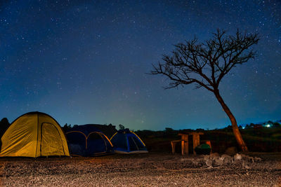 Tent against sky at night