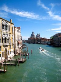 Boats on canal in venice