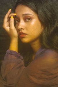 Close-up portrait of a woman looking away