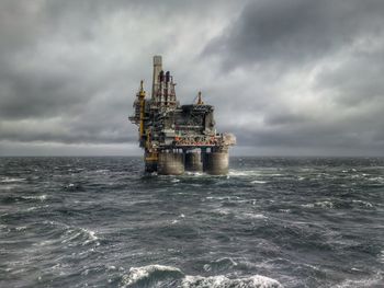 Ship in sea against sky