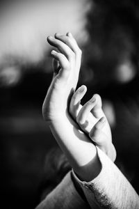 Close-up of human hand against blurred background